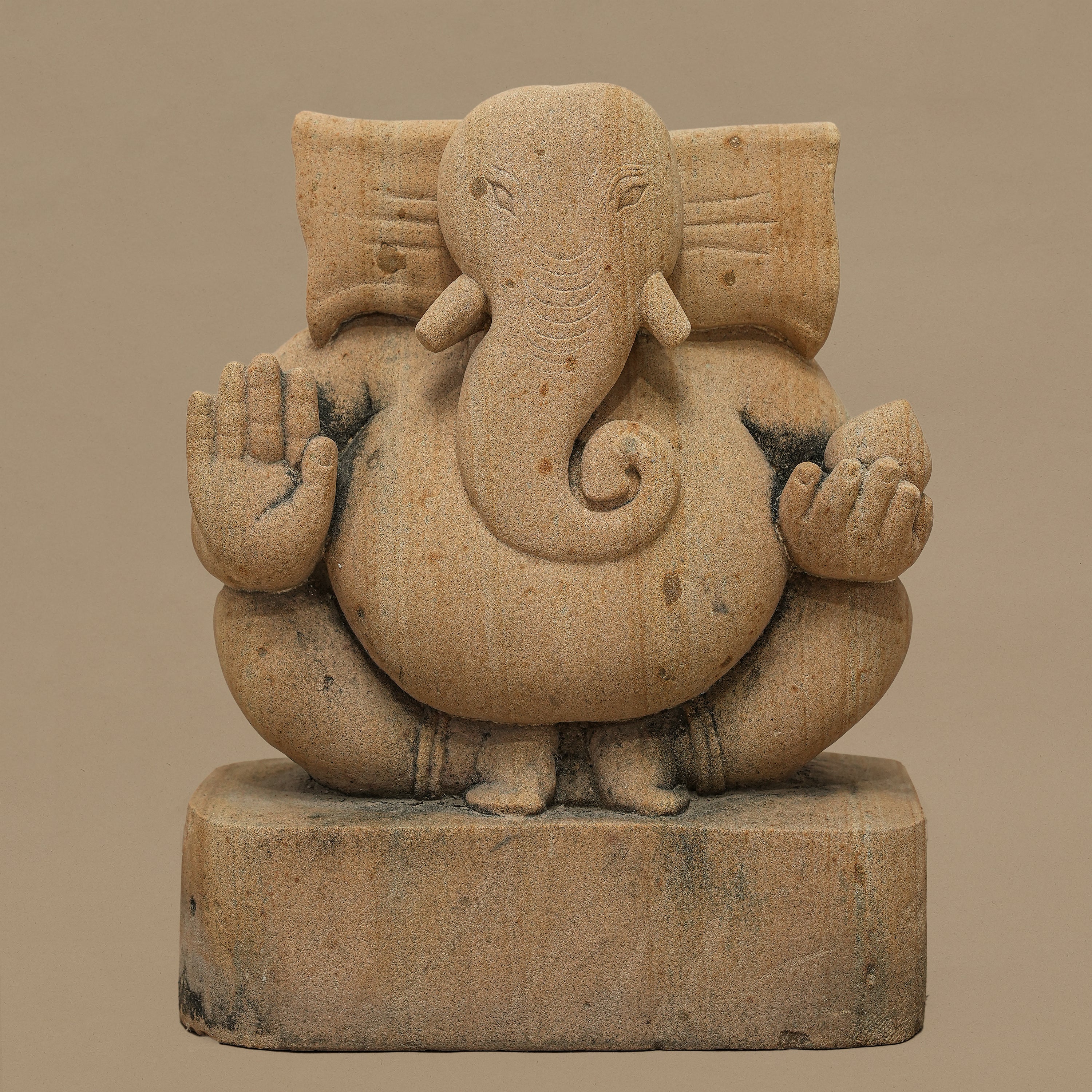 Front view of 11 inch Lord Ganesh statue handcrafted in yellow sandstone