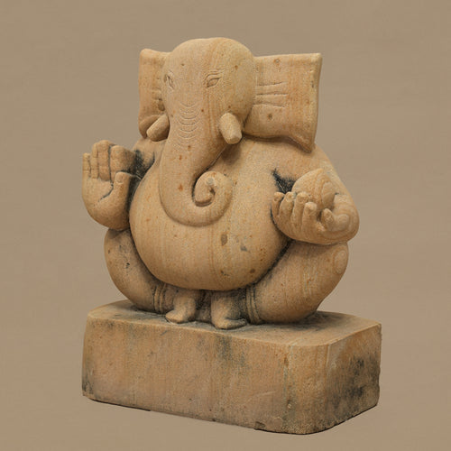 Right angle view of 11 inch Lord Ganesh statue handcrafted in yellow sandstone