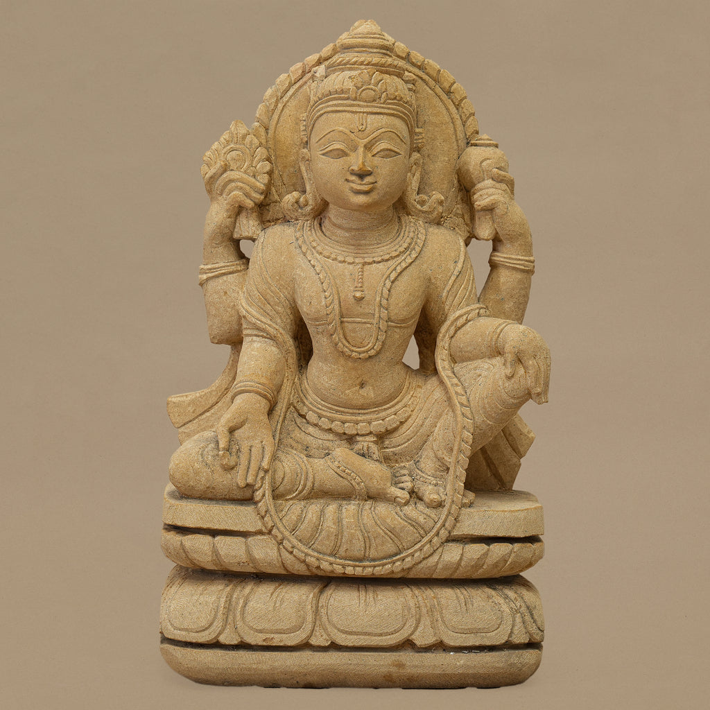 12 inch Lord Vishnu statue handcrafted from yellow sandstone in seated posture