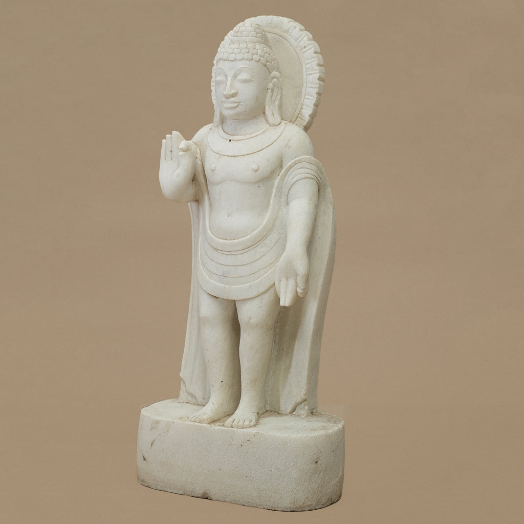 Left angle view of 15 inch standing Lord Buddha statue carved from white marble