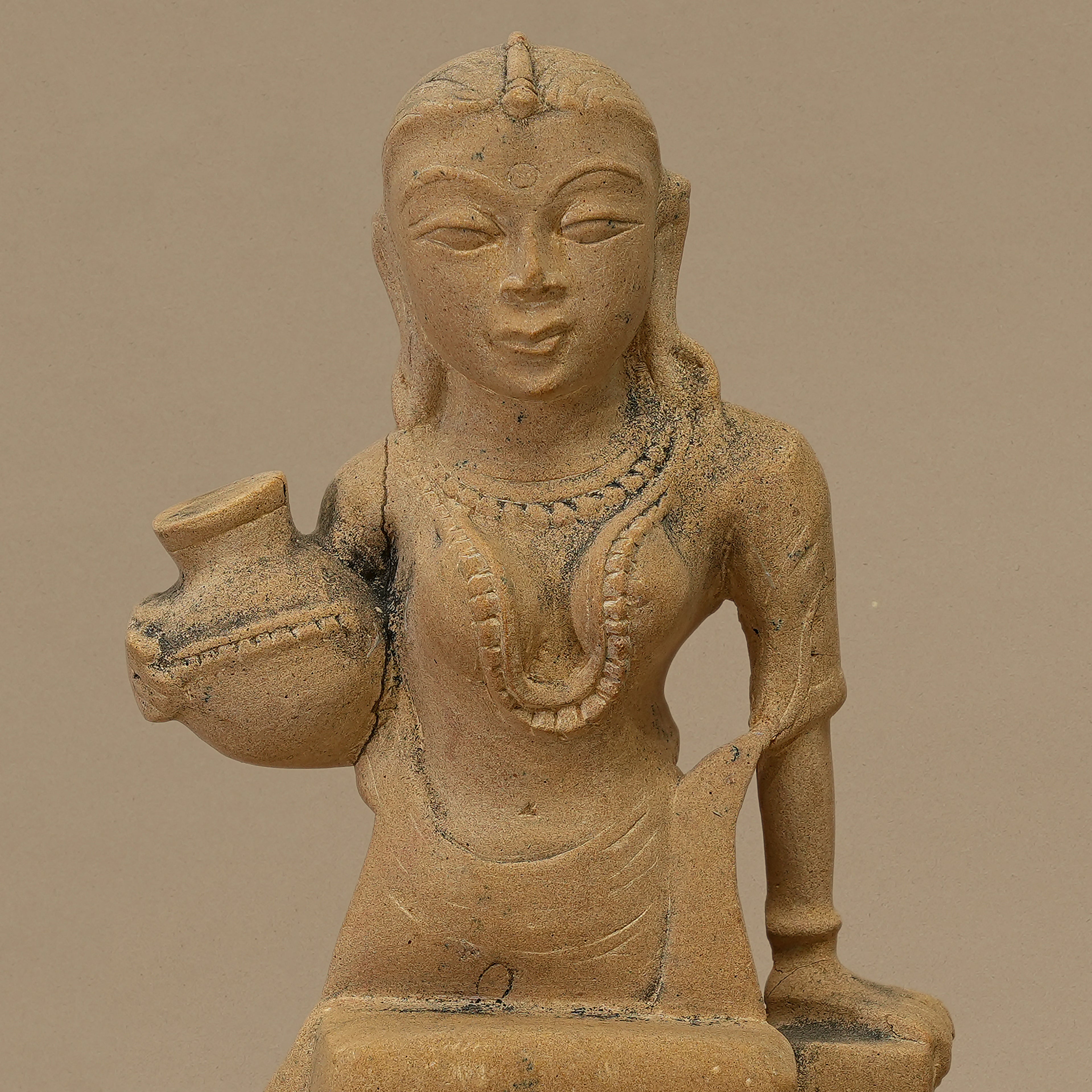 10.5" Pot-Holding Female Statue | Handcrafted from Yellow Sandstone